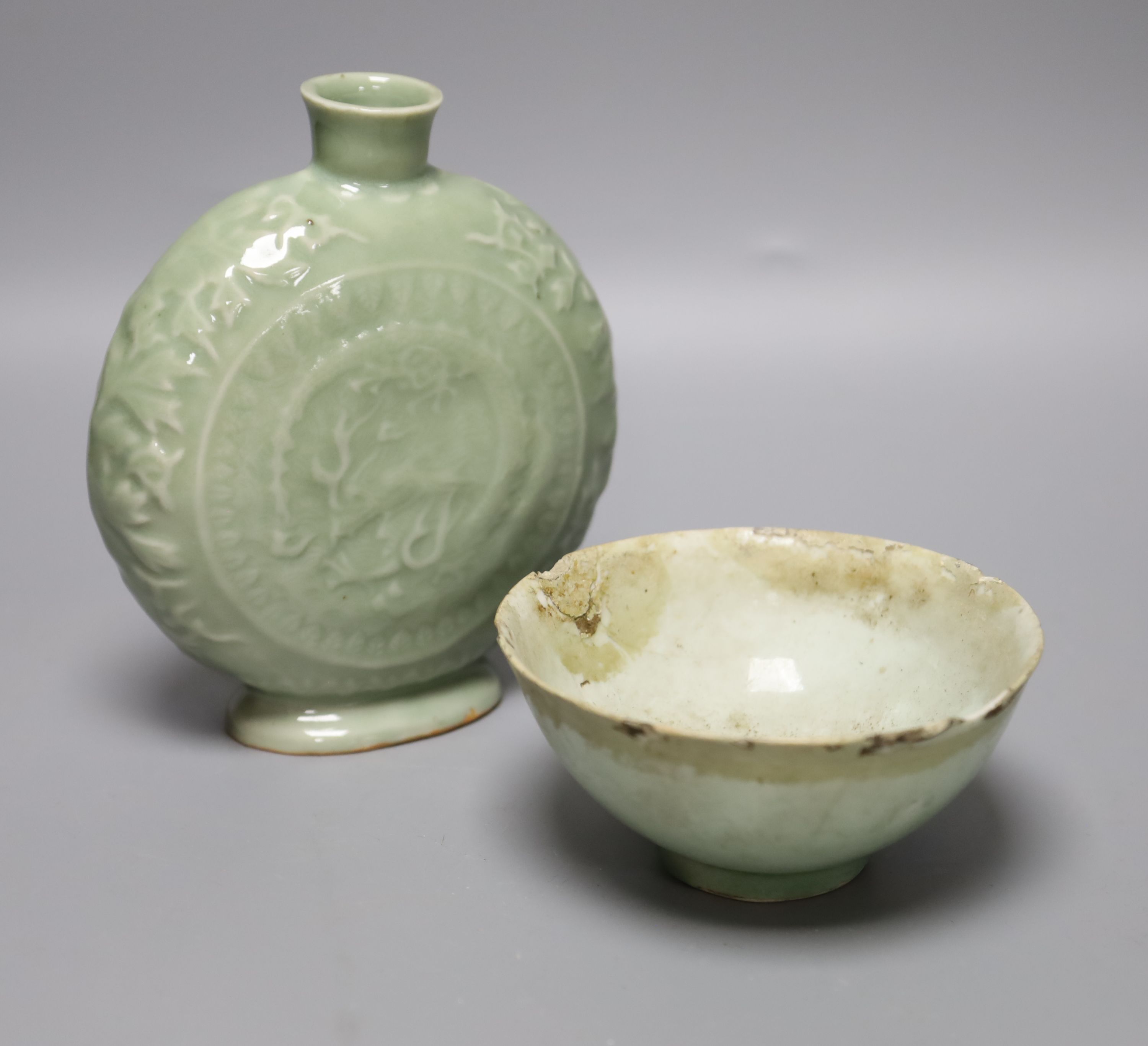 A Chinese celadon glazed moonflask, height 17cm, and bowl